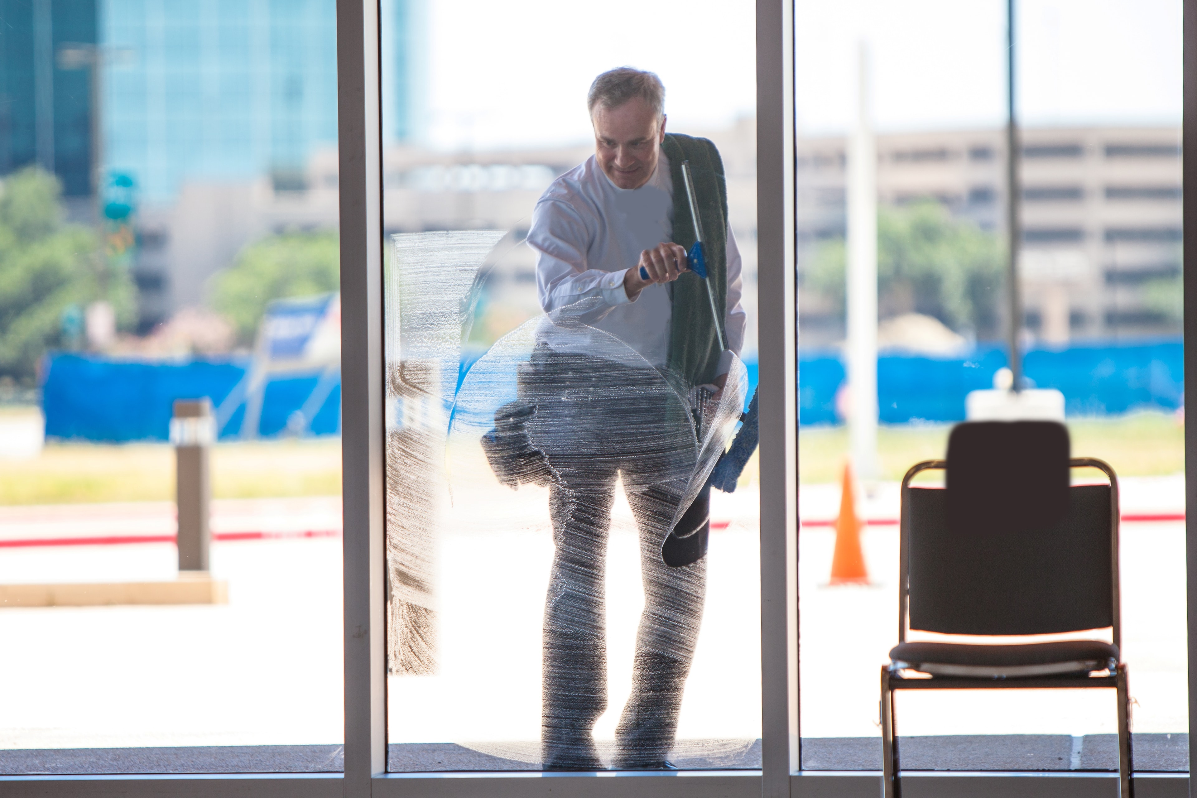Friendly professional window cleaner